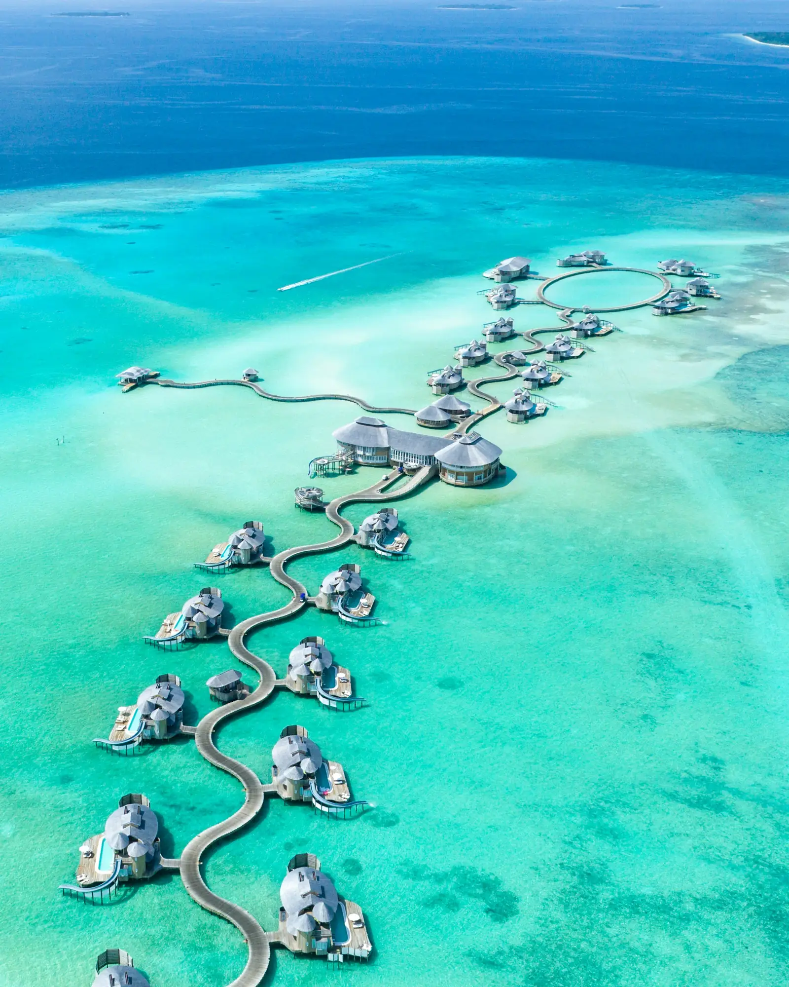 Overwater villas in a Maldives lagoon