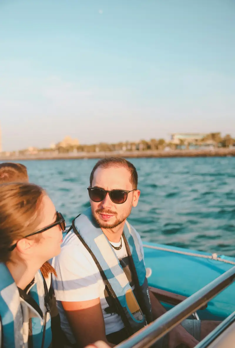 A couple on a speedboat ride along the Dubai coast